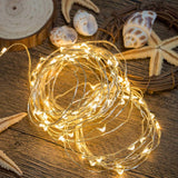 KOOVON Fairy Lights Plug in, 33Ft 100 LEDs Waterproof Silver Wire Firefly Lights, Adaptor Included, Starry String Lights for Wedding Indoor Outdoor Christmas Patio Garden Decoration, Warm White